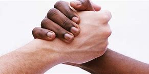 Image result for black hand white handshake